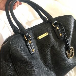 Black Michael Kors purse w/ gold embellishments